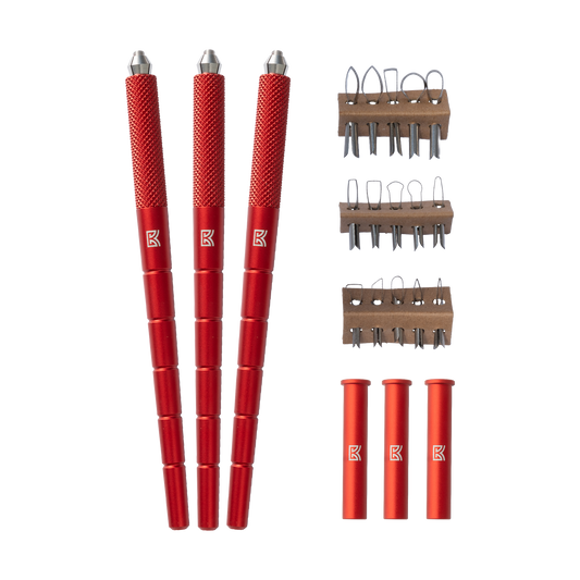 arrangement of red dragonfly pottery carving tools next to accessories and blade packs. 